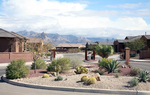 Xeriscaped garden outside residential housing complex.