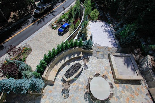 Overhead shot of stone patio and garden.