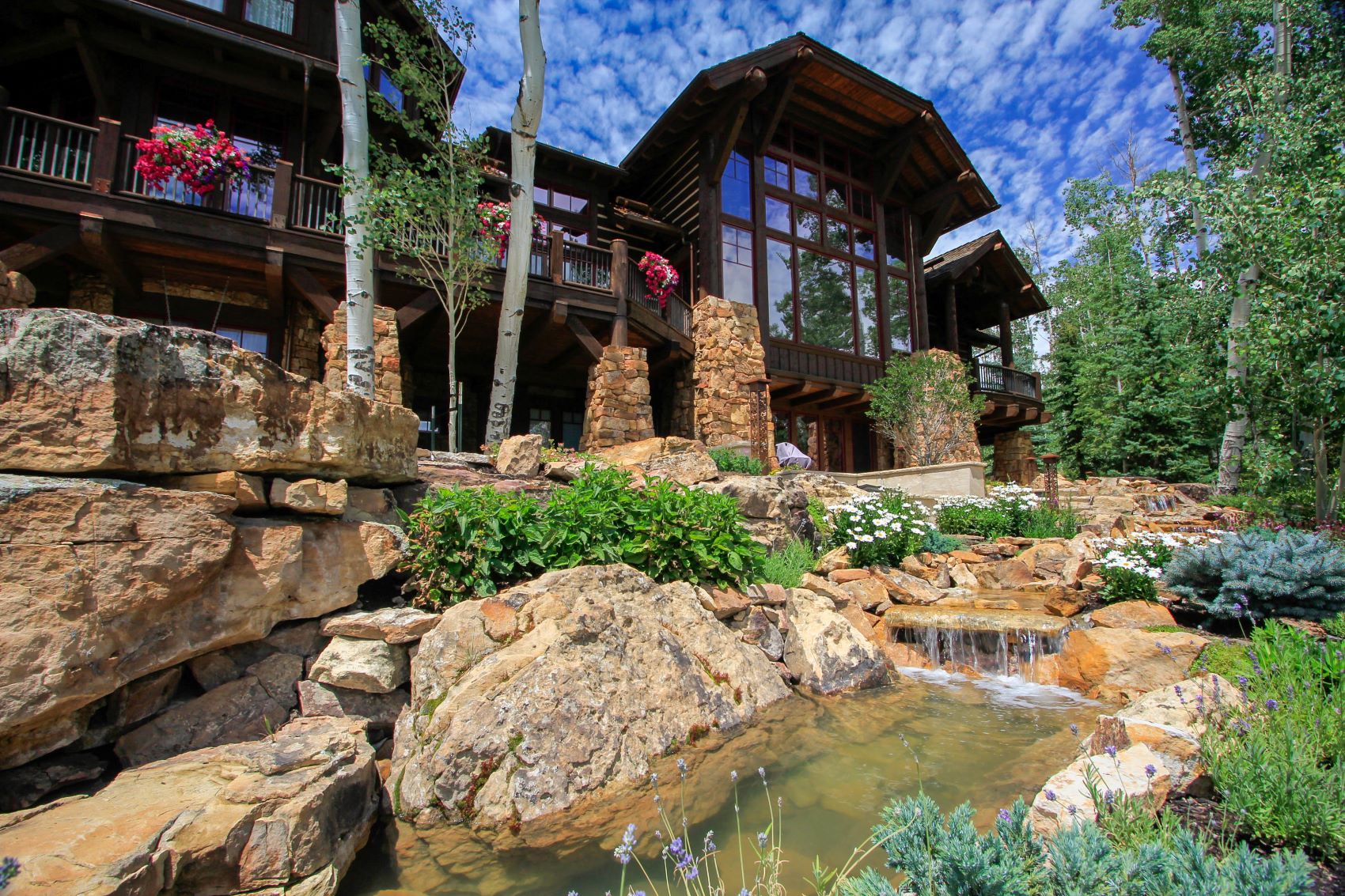 Colorado property with waterfall.